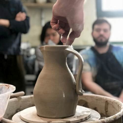 Jug with hand