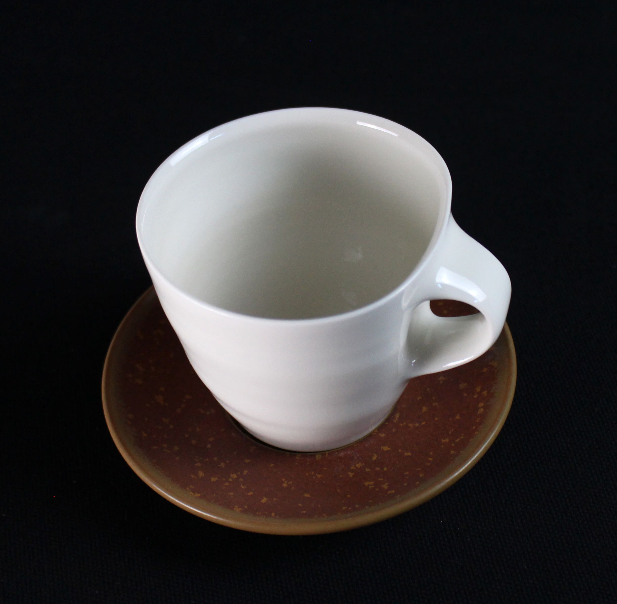 Small Cup and Saucer by Katharina Treml