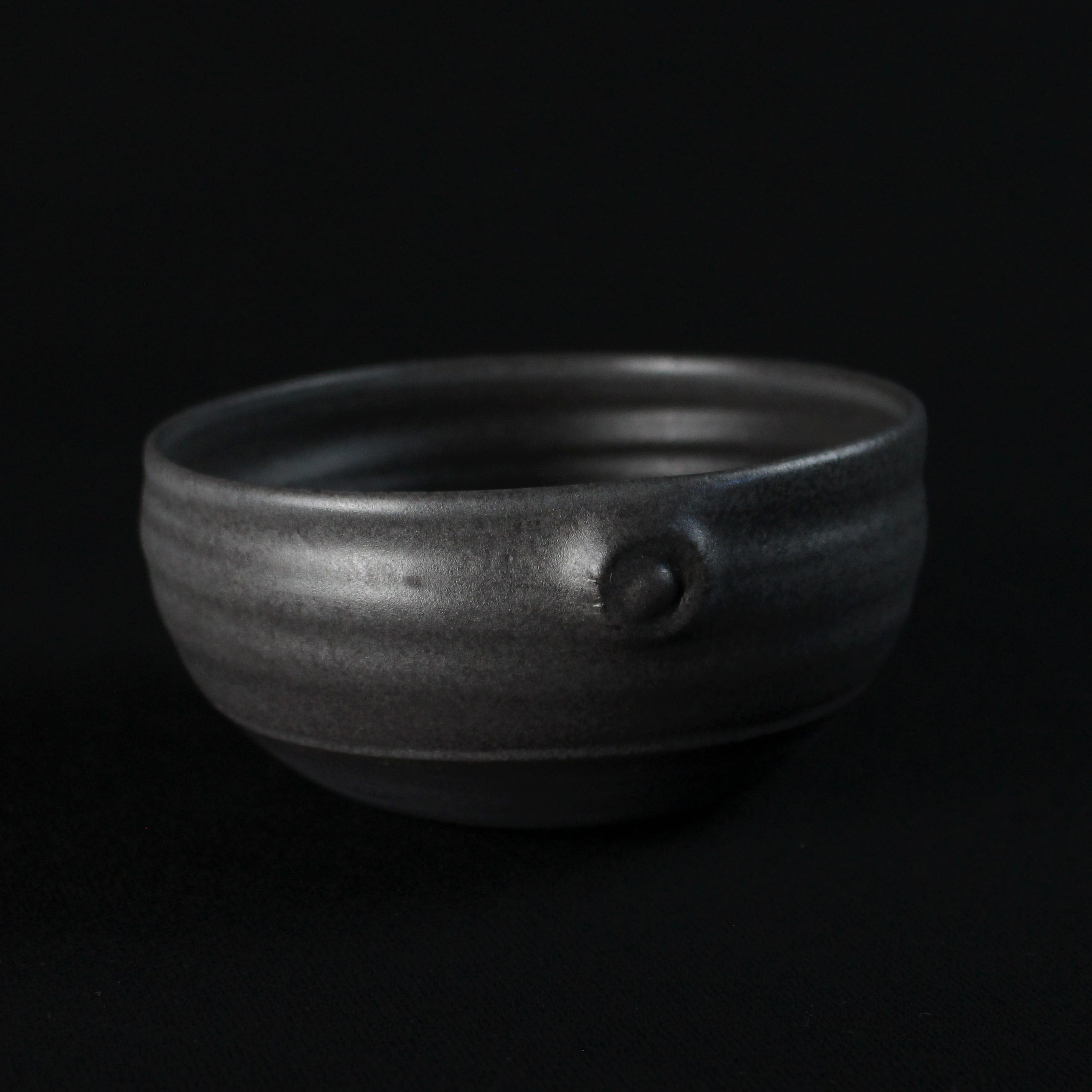 Moonlight Small Bowl in black porcelain by Zeita Scott