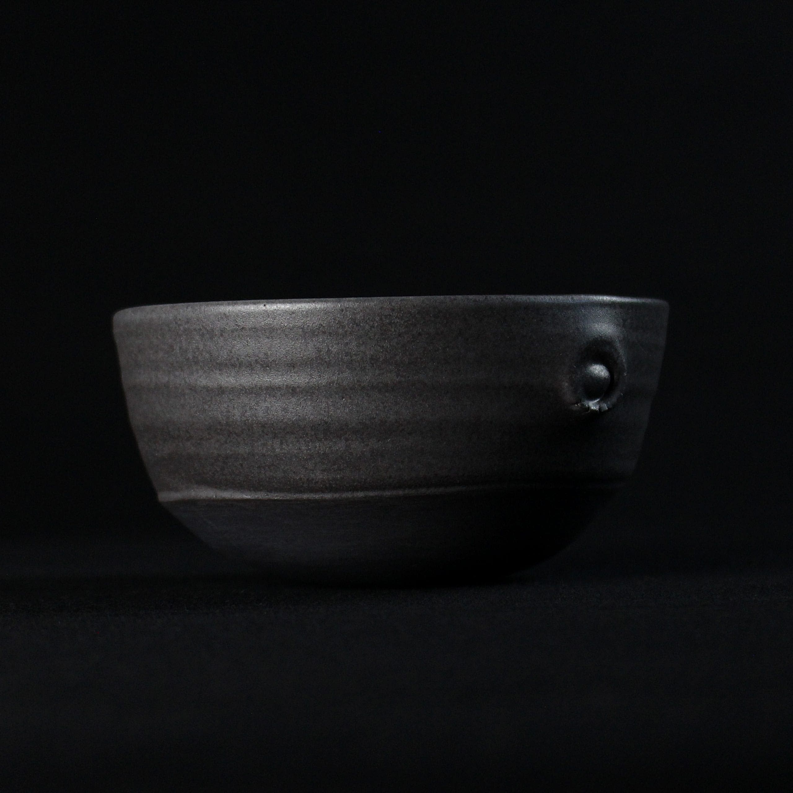 Moonlight Small Bowl in black porcelain by Zeita Scott